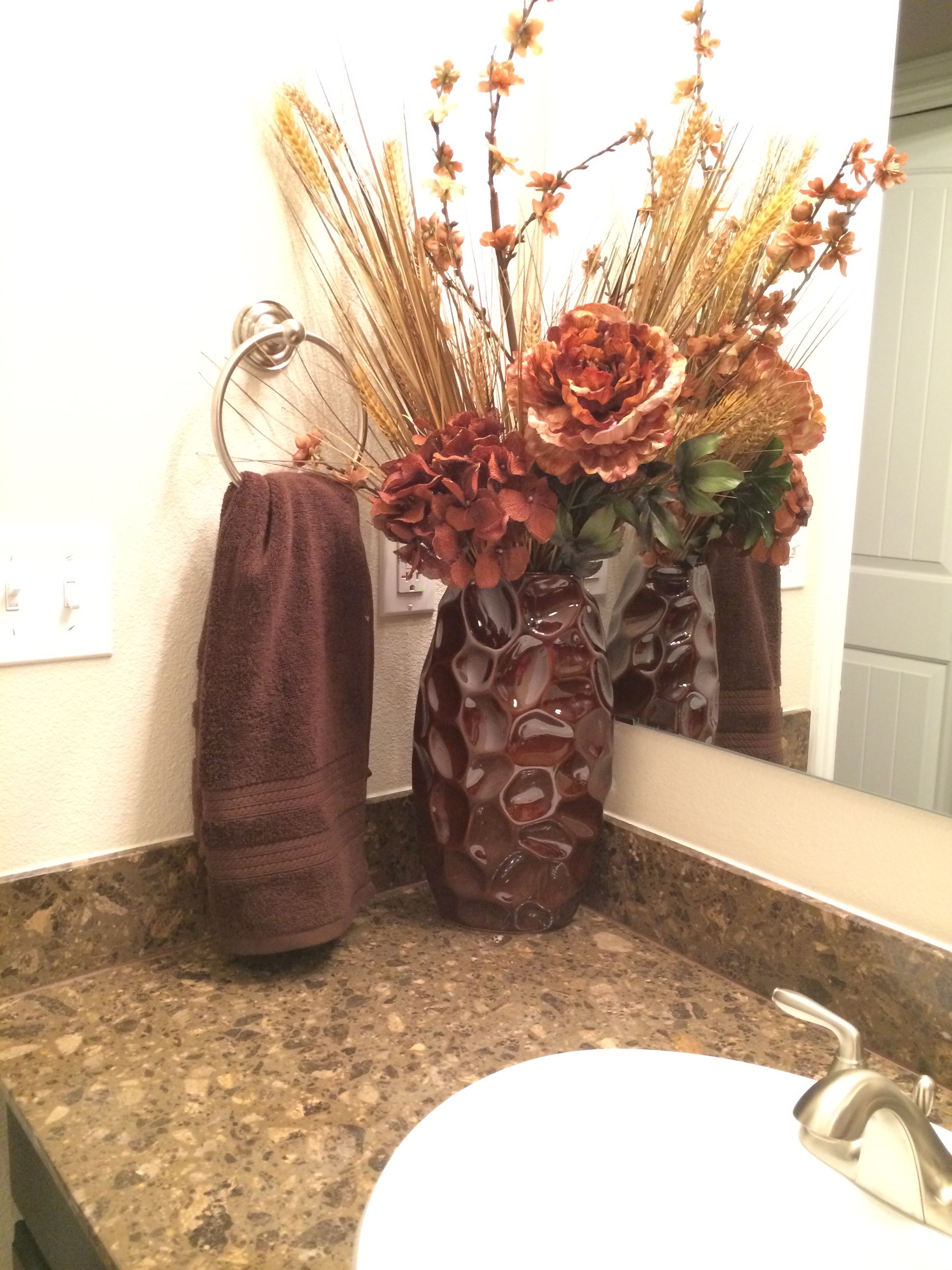 Brown Bathroom floral arrangement | Bathroom feature wall, Classic