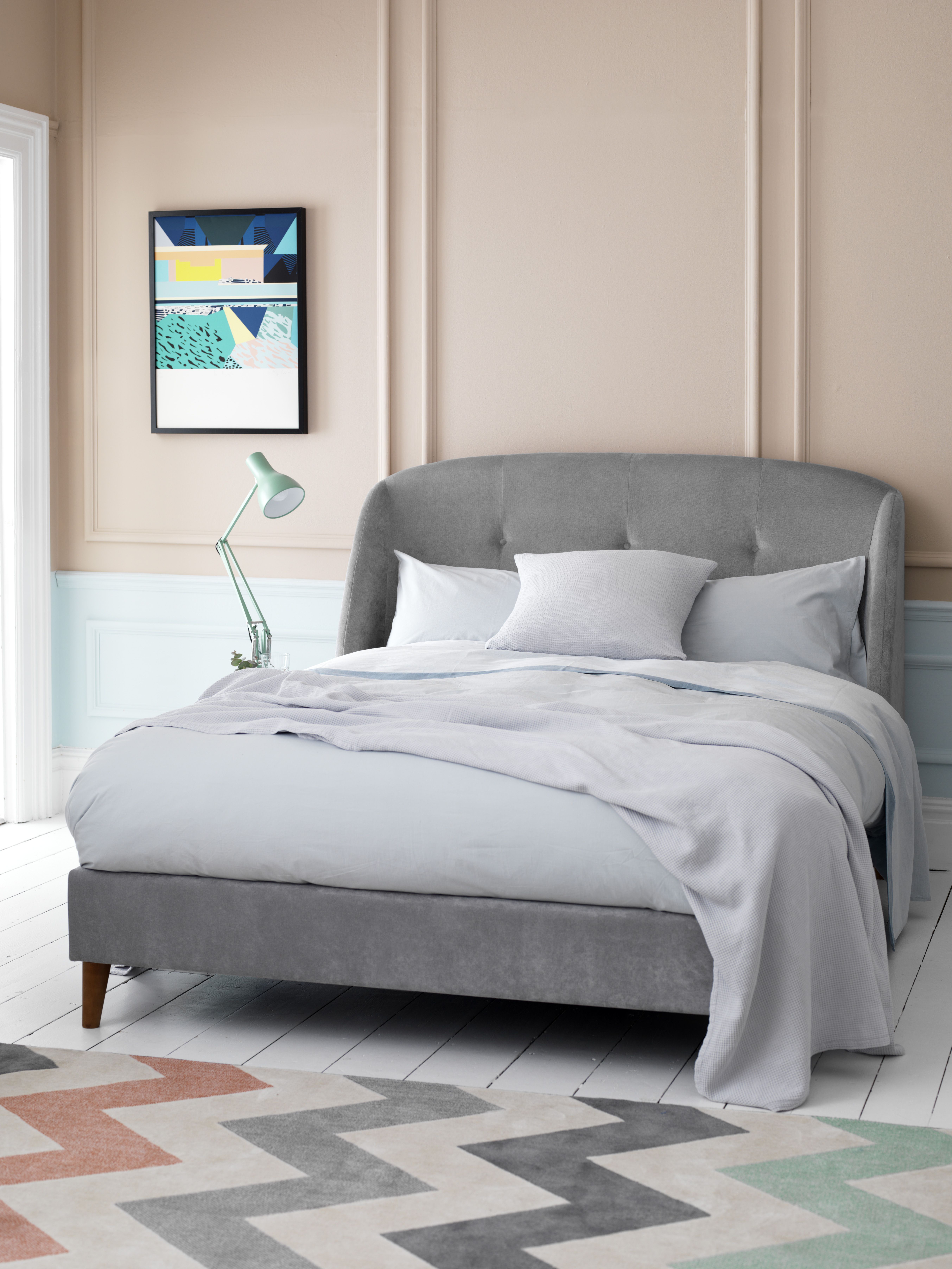 With its subtle curves, angled headboard and splayed legs, the Jasmine