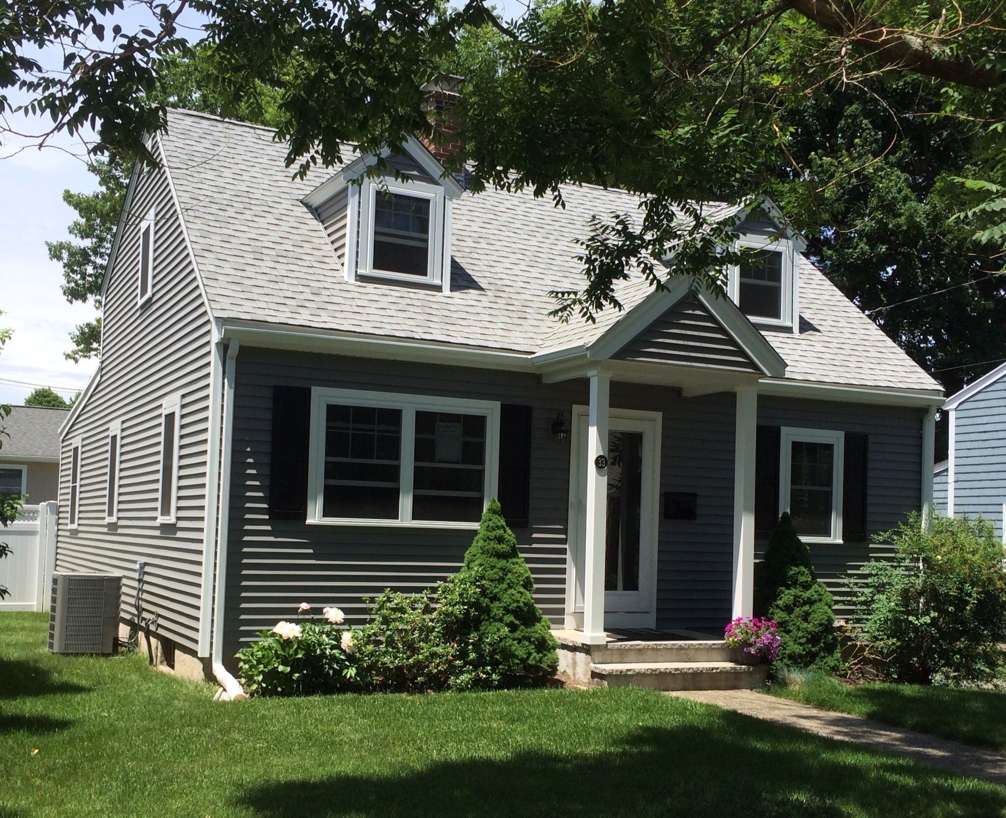 @CertainTeed Corporation siding in Charcoal Gray and @Harvey Building